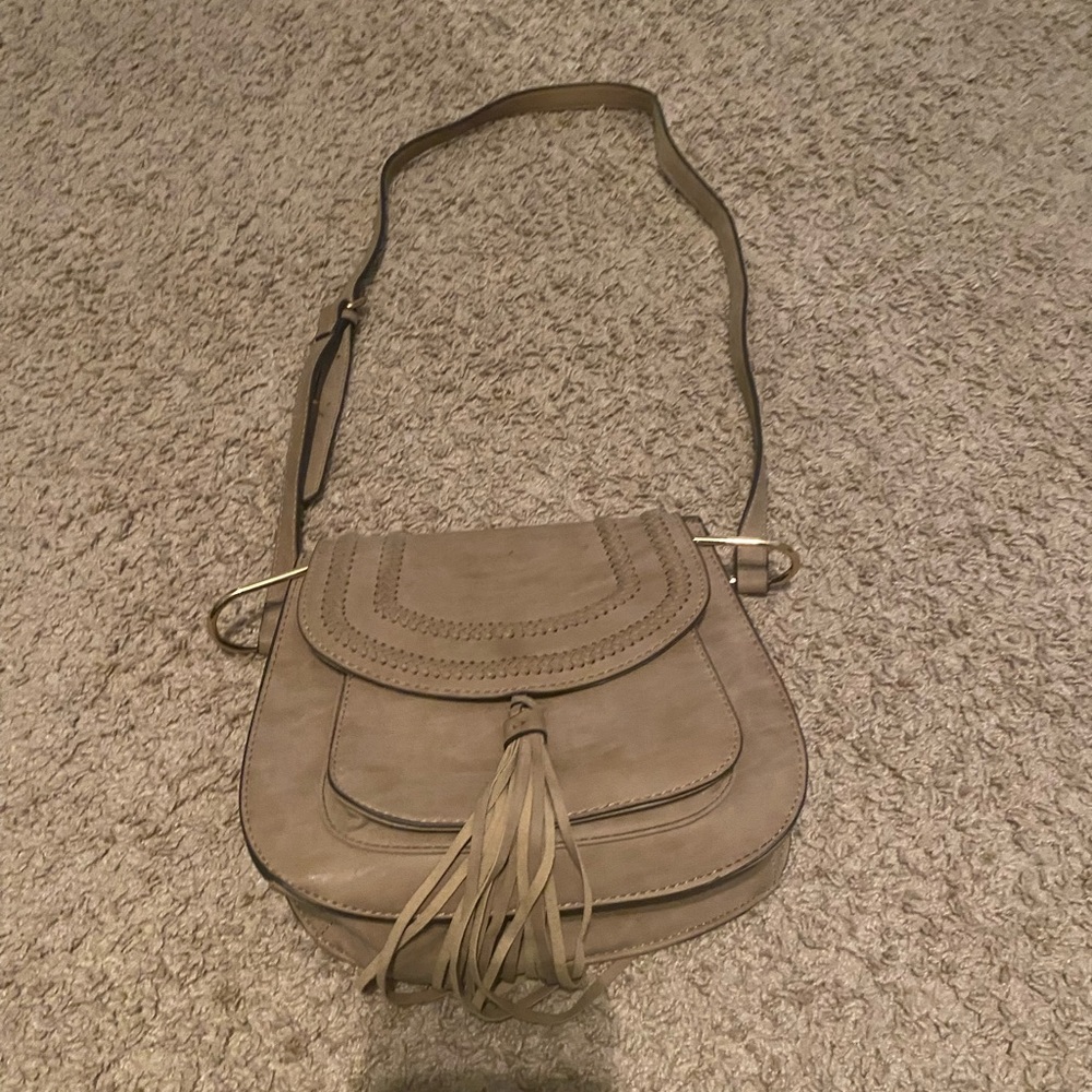 Western cross body bag with tassel vegan leather 9.3” by 2.4” by 8.3” stone colo